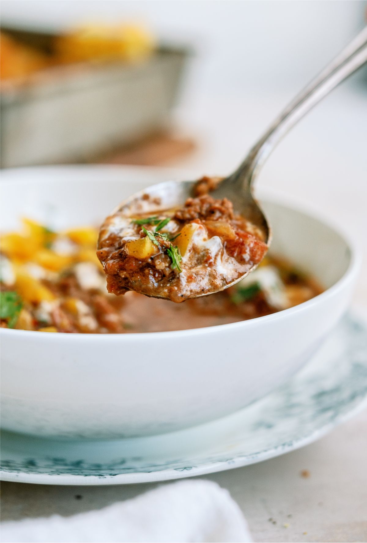 A bowl of Instant Pot No-Bean Chili with Ground Beef with a spoon