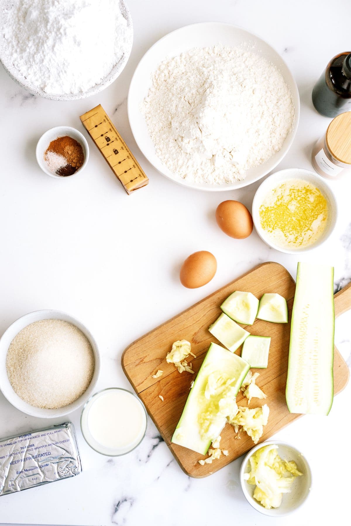 Ingredients needed to make Sheet Pan Zucchini Cake with Frosting.