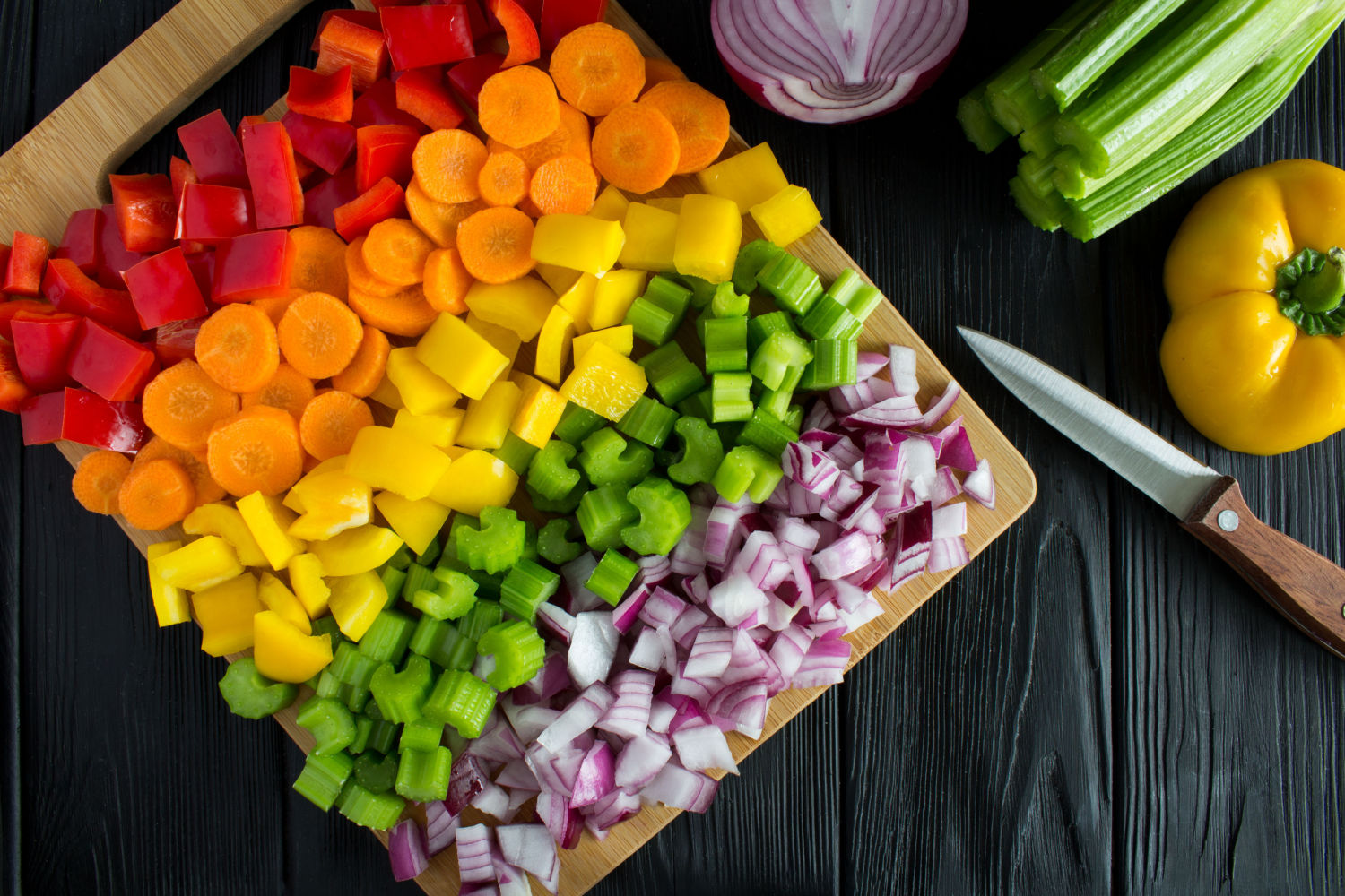 fresh chopped vegetables ready to be used for freezer meals