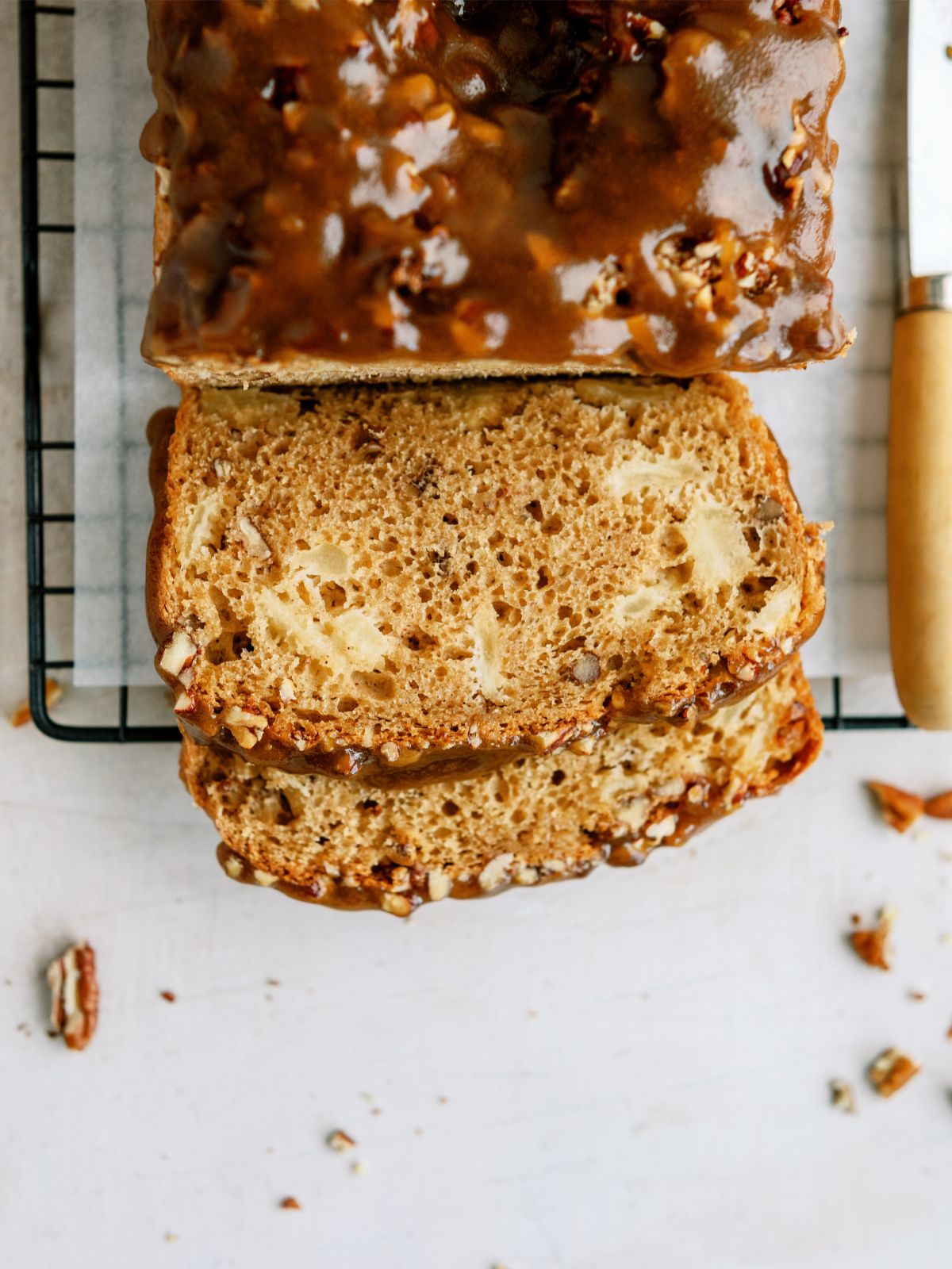 Top view of Apple Praline Bread with some of the loaf sliced