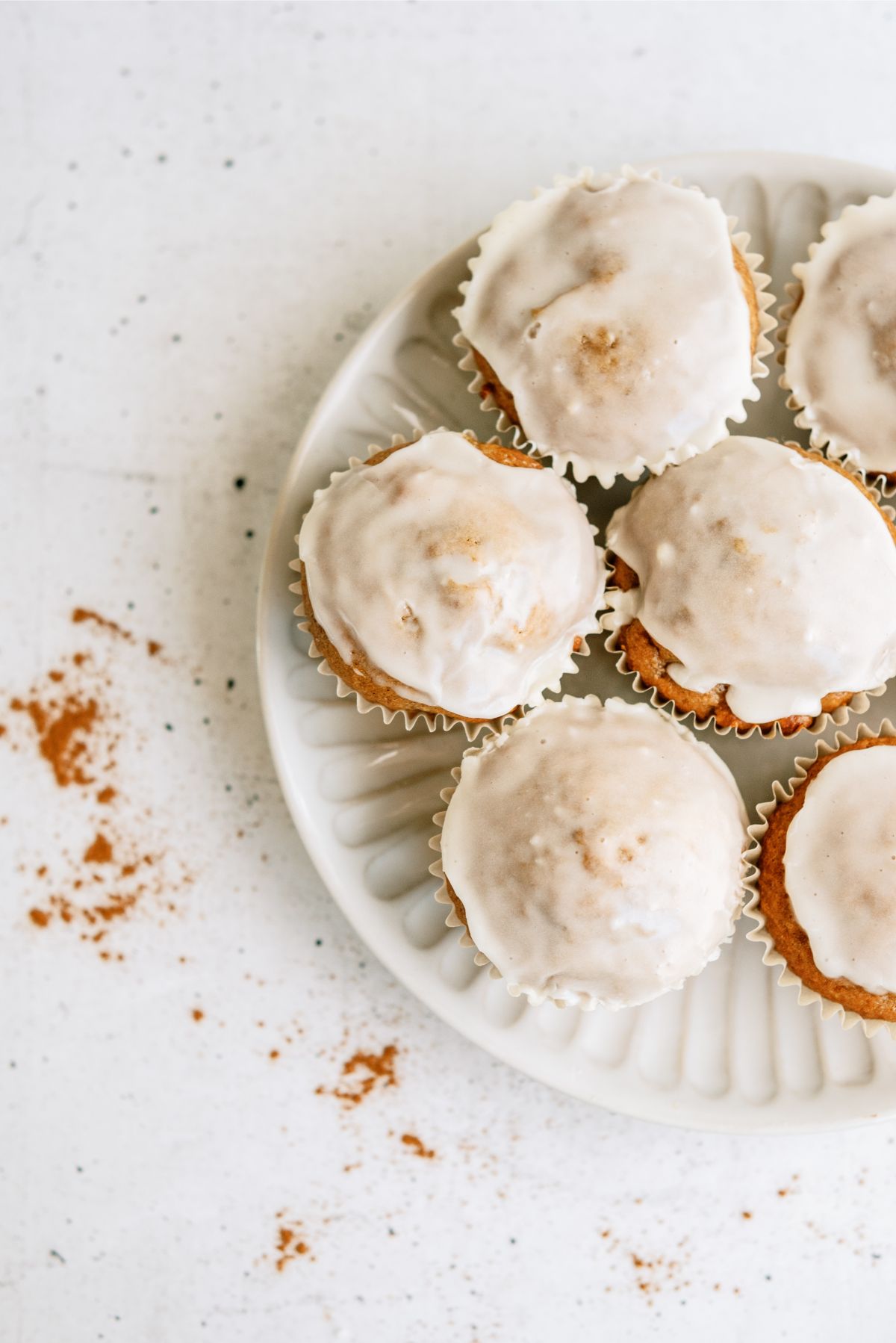Baked Apple Fritter Muffins on a serving plate