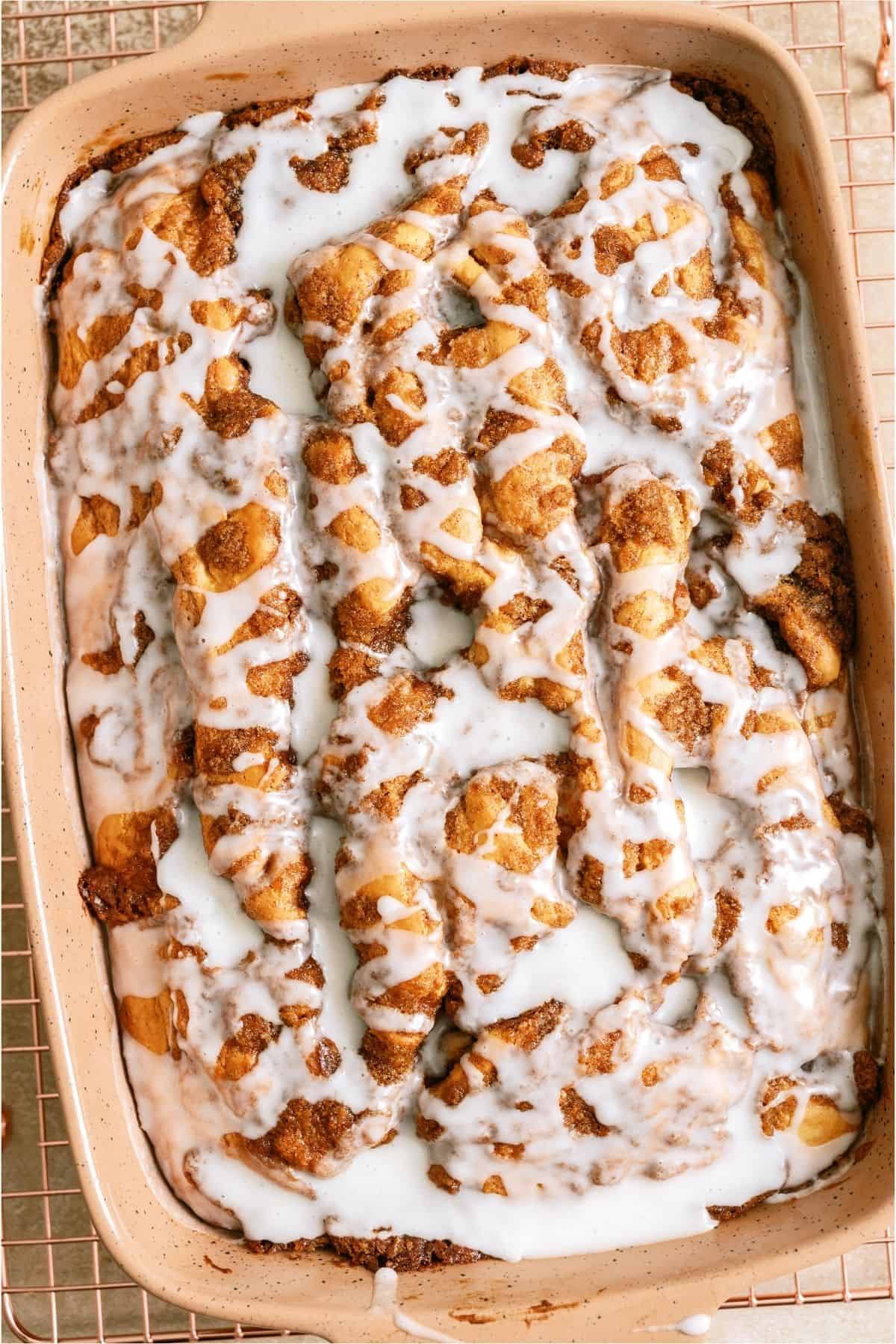 Top view of Cinnabon Cinnamon Roll Cake in baking dish.