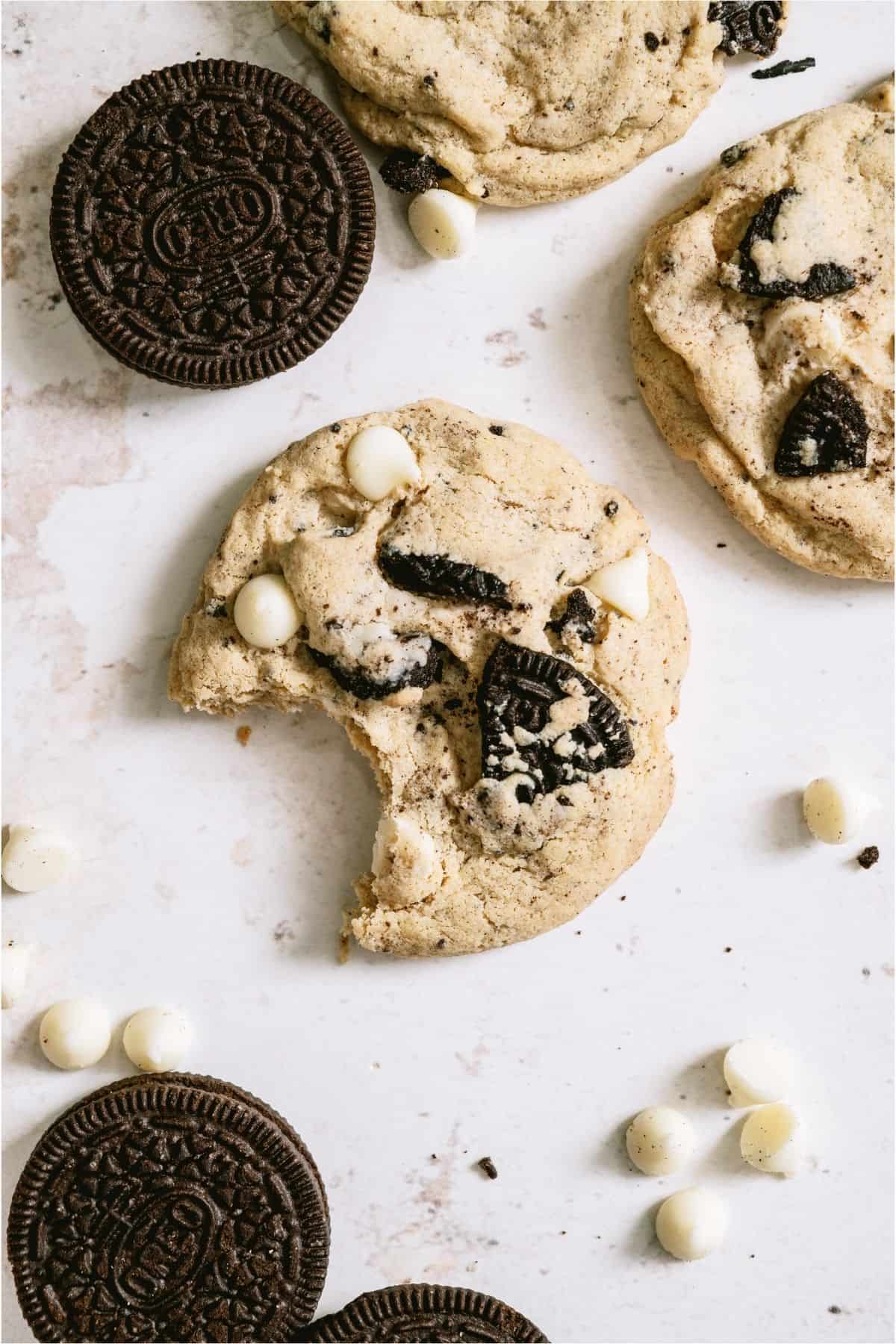 Top view of a Cookies and Cream Cookie with a bite missing.