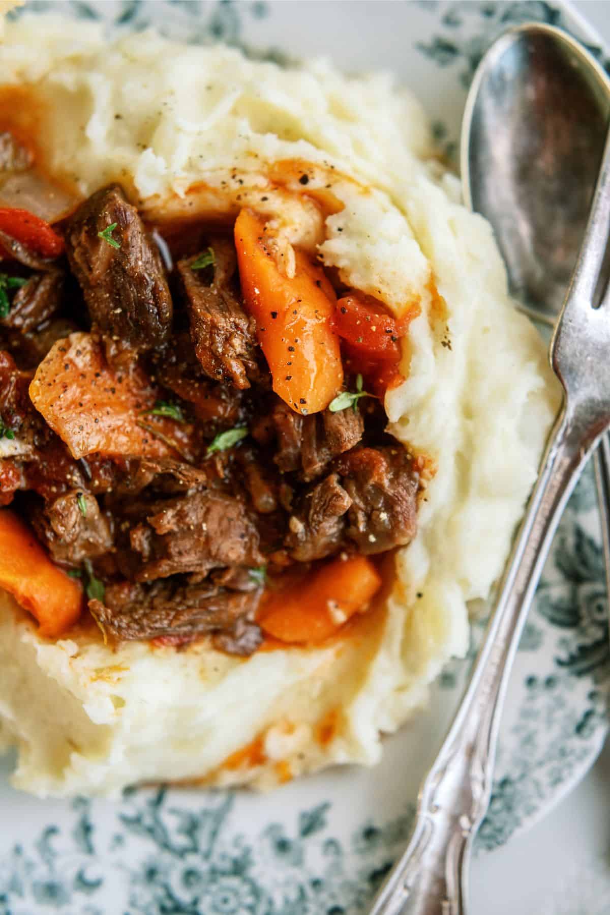 Instant Pot Beef Daube Stew with Mashed Potatoes on a plate