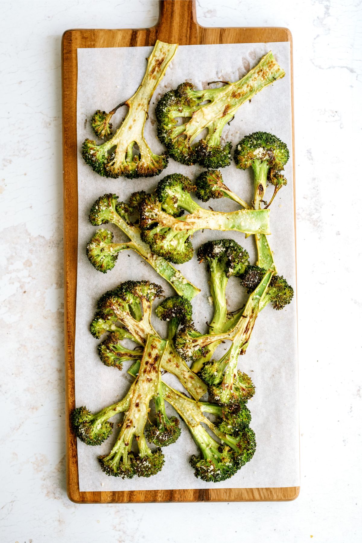 Oven-Roasted Broccoli Steaks on a cutting board