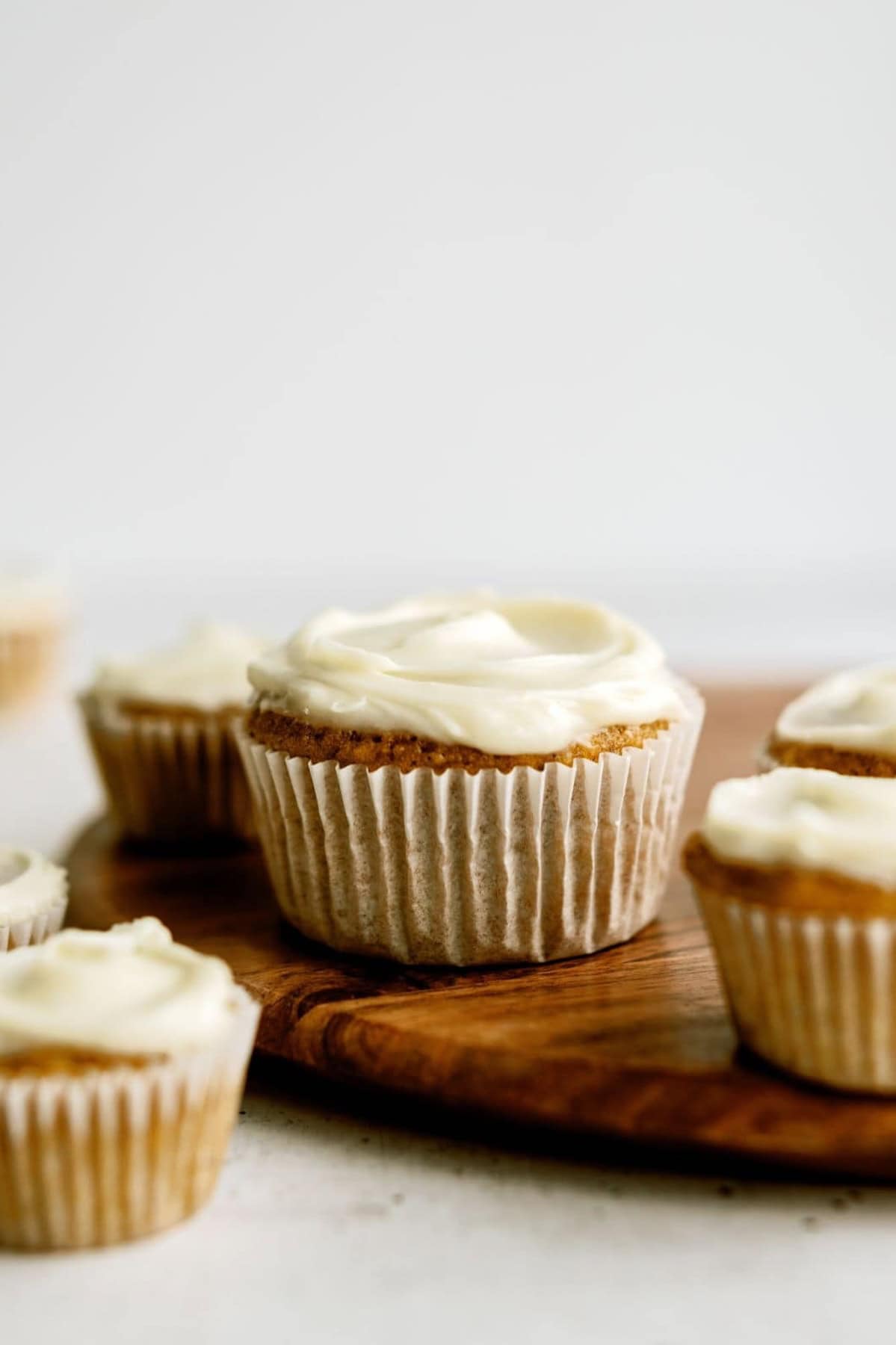 Side view of Pumpkin Muffin Bites on a cutting board