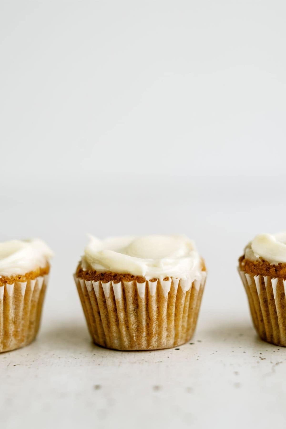 Side view of Pumpkin Muffin Bites frosted