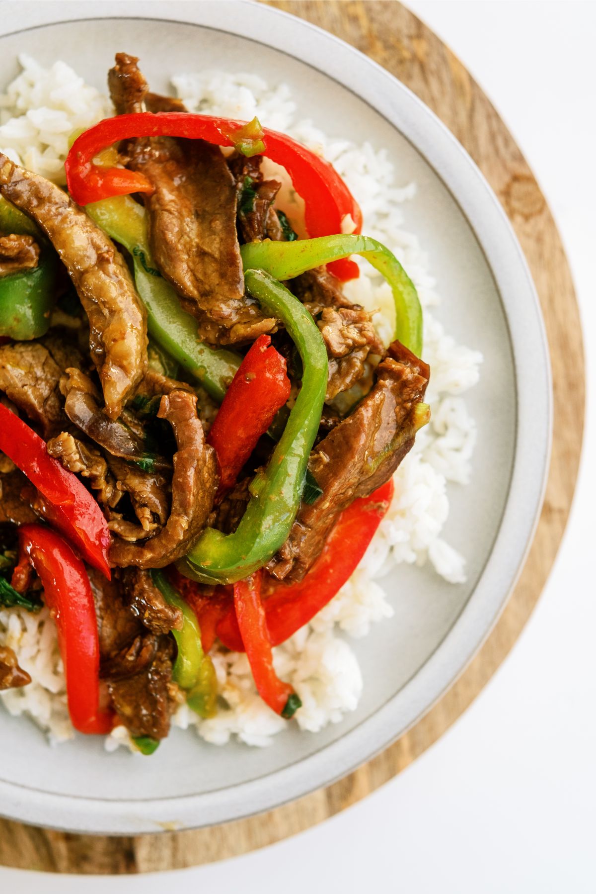 Instant Pot Pepper Steak Recipe with Rice on a plate