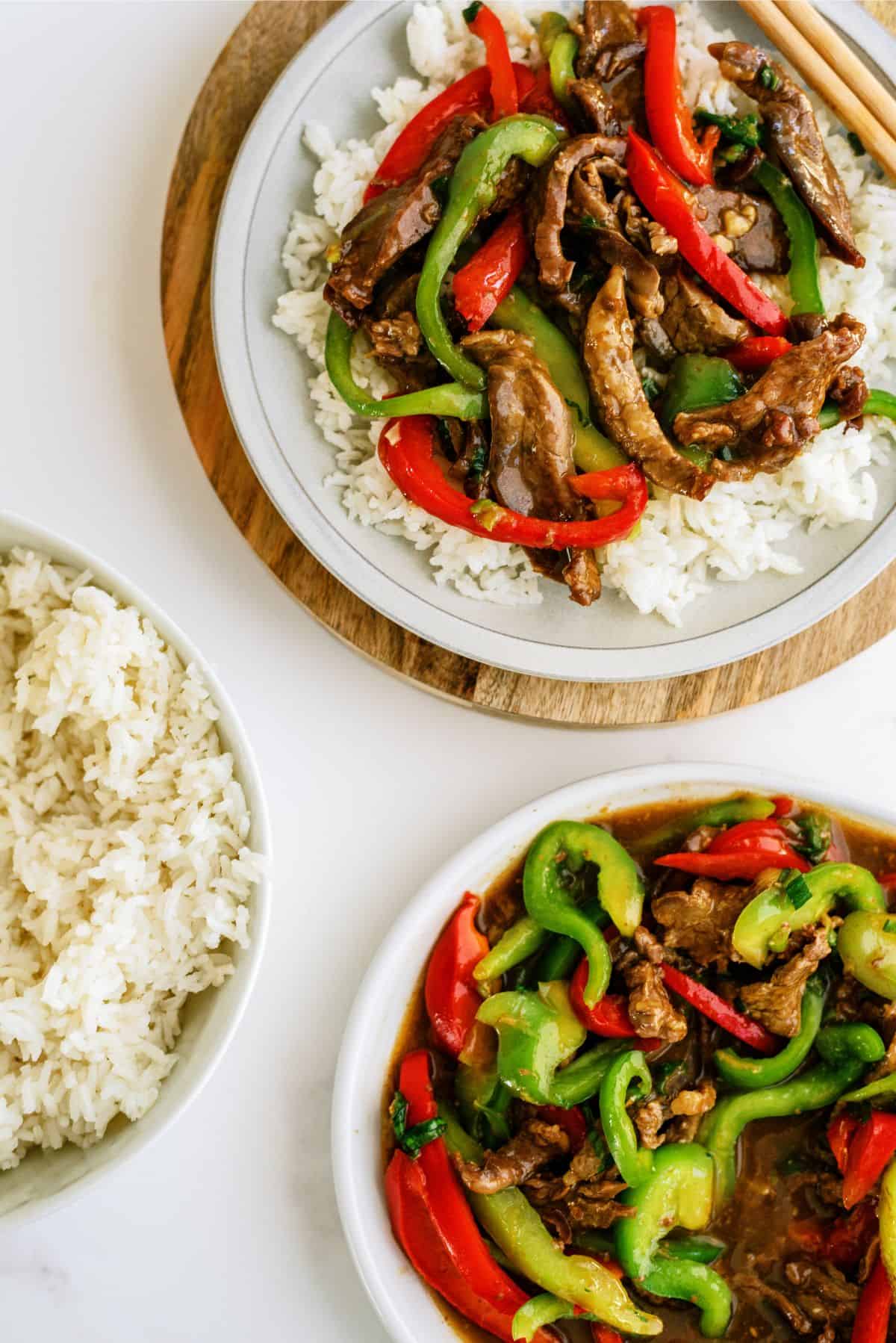 2 plates of Instant Pot Pepper Steak Recipe with Rice