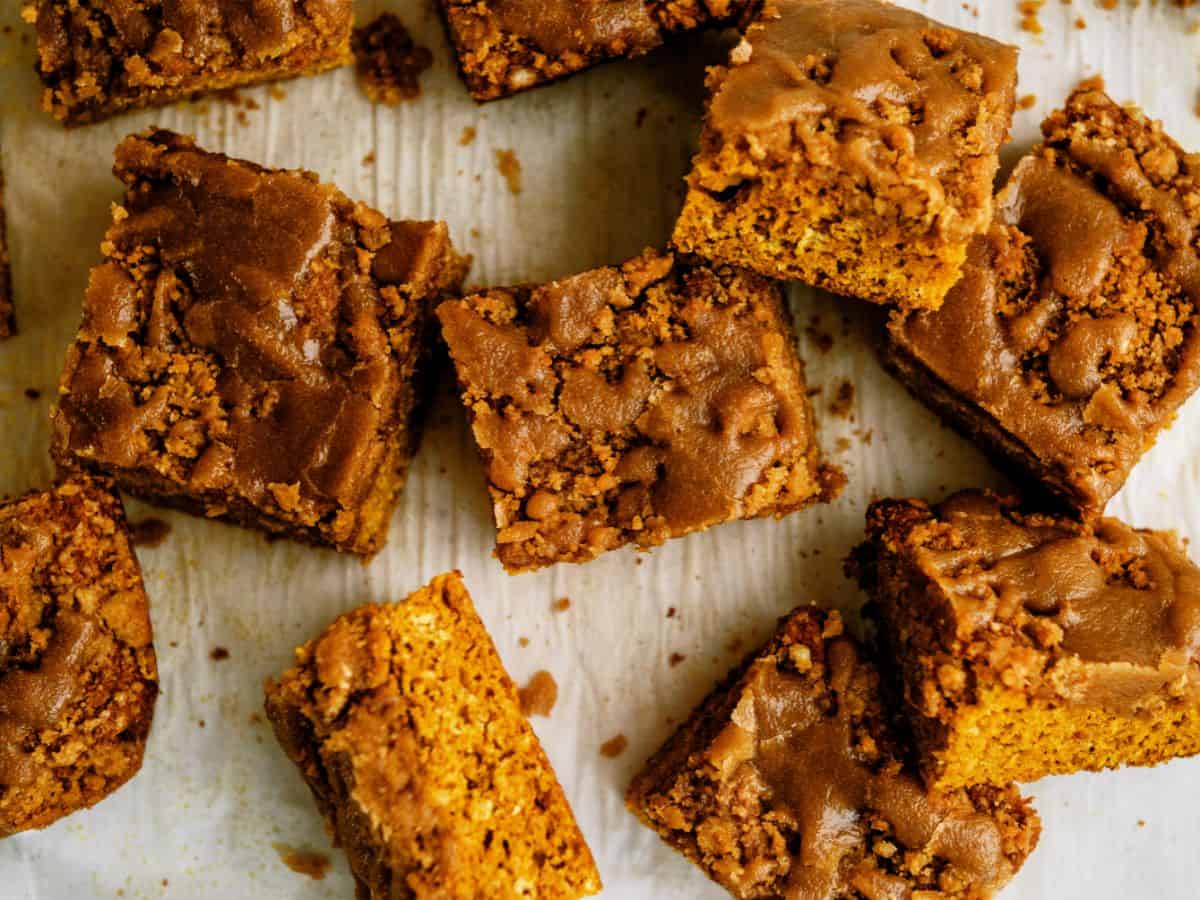 Pumpkin Coffee Cake with Brown Sugar Glaze cut into squares