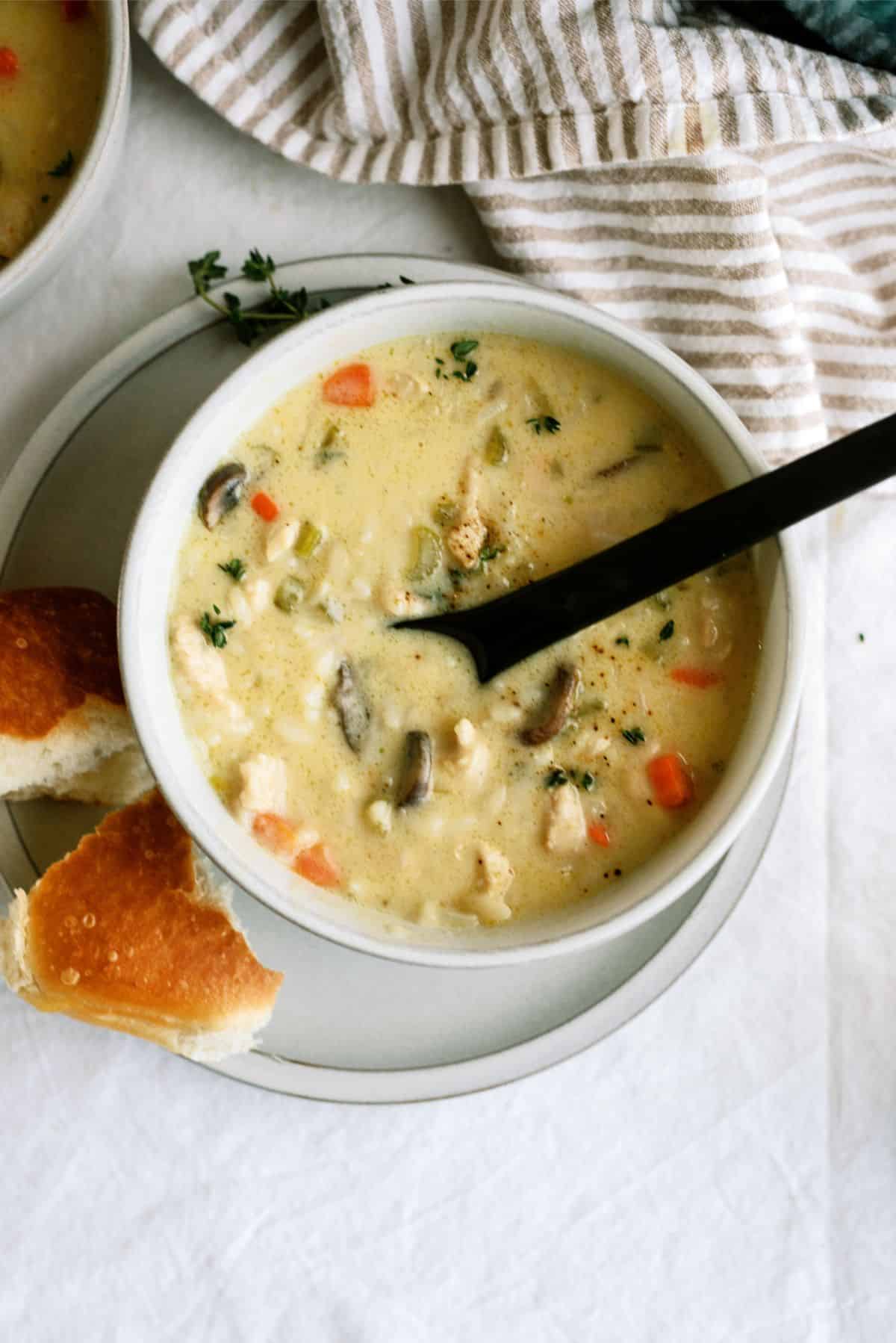 Top view of a bowl of Creamy Chicken and Wild Rice Soup