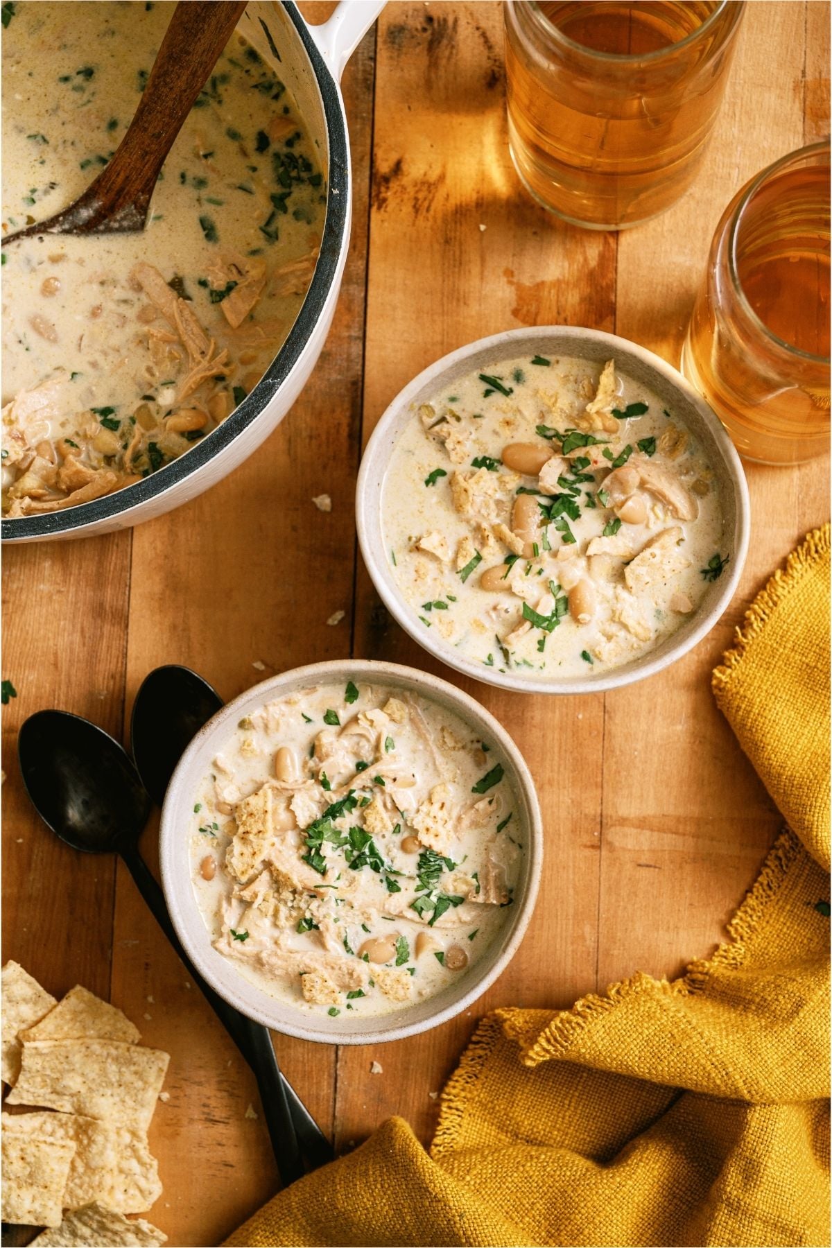 Top view of two bowls of Creamy White Chicken Chili.