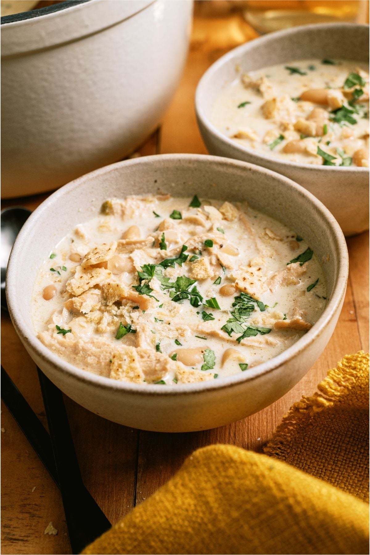 Side view of a bowl of Creamy White Chicken Chili.