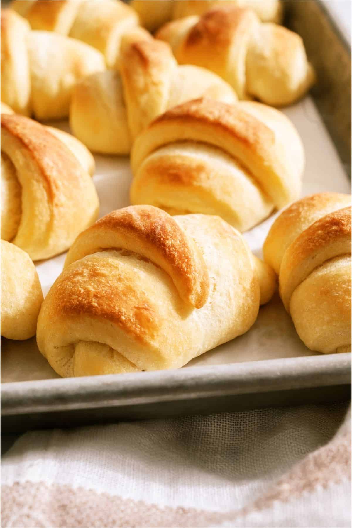 Close up of Easy Homemade Rolls on a sheet pan.