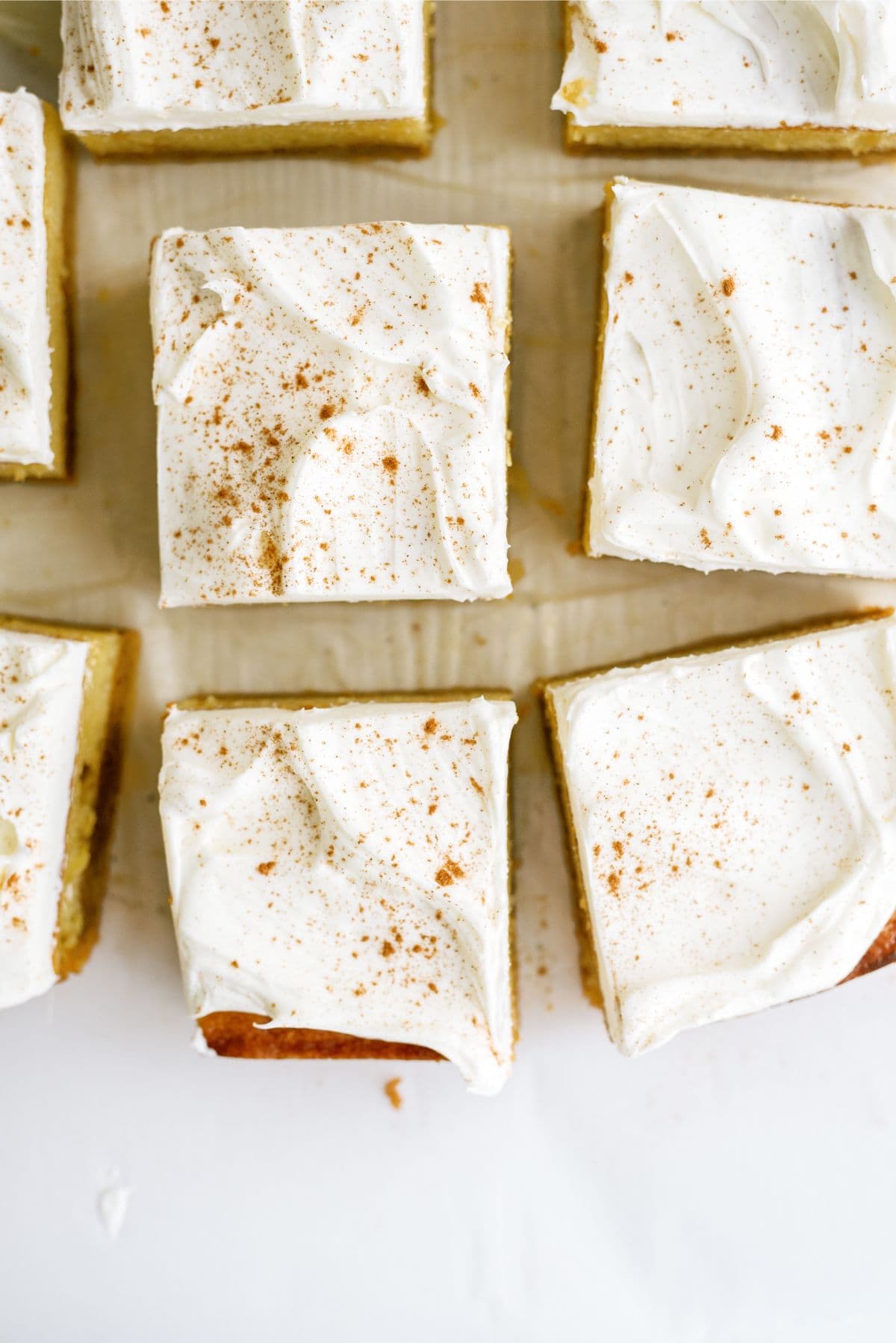 Pumpkin Layered Magic Cake cut into squares