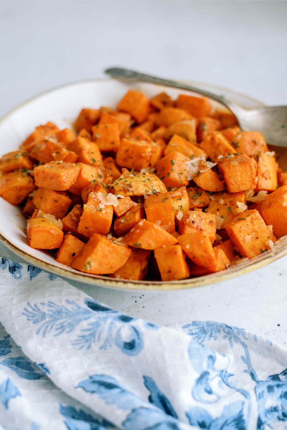 Roasted Parmesan Sweet Potatoes in a serving bowl
