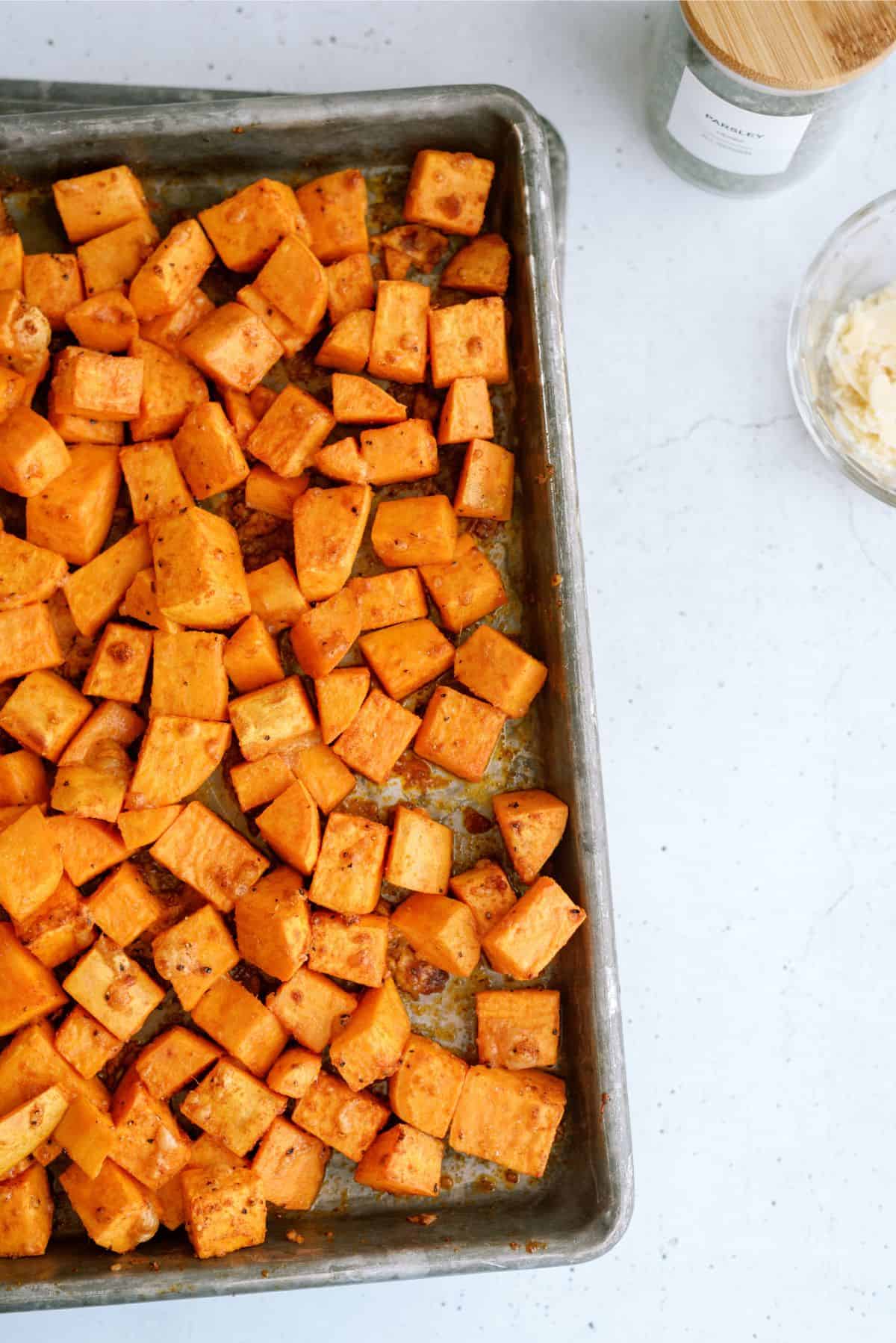 Roasted Parmesan Sweet Potatoes on a baking sheet