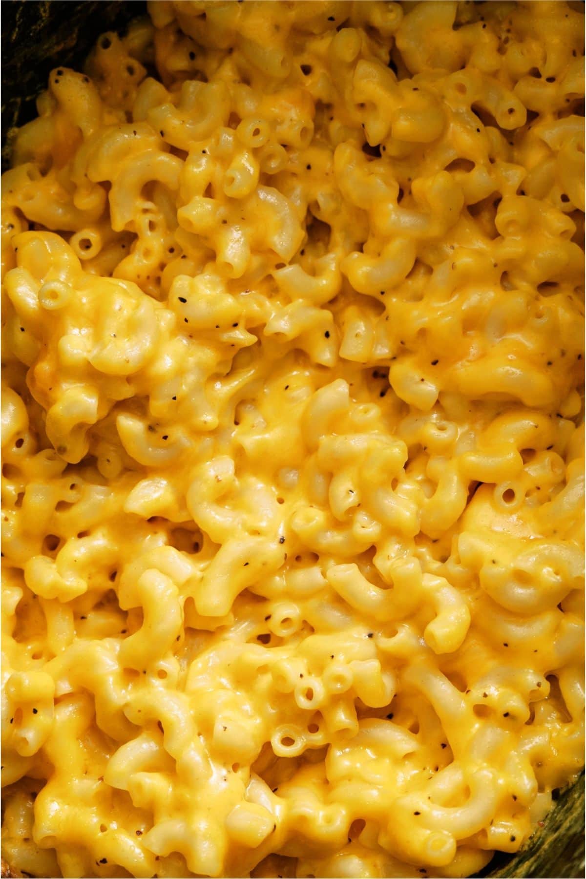 Close up of Slow Cooker Creamy Macaroni and Cheese in the slow cooker.