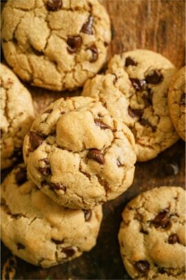 Chewy Chocolate chip cookies on a wooden table.