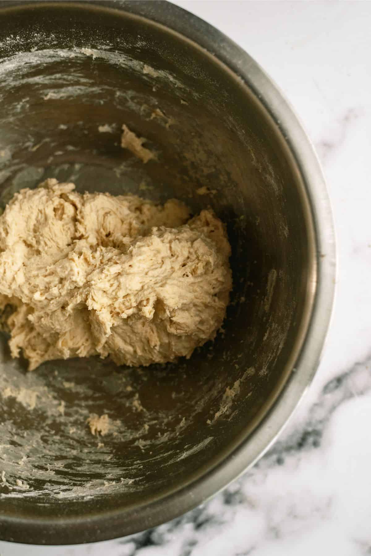 Pizza dough in mixing bowl