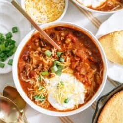 A bowl of Instant Pot Chili (Dump and Go) with toppings.