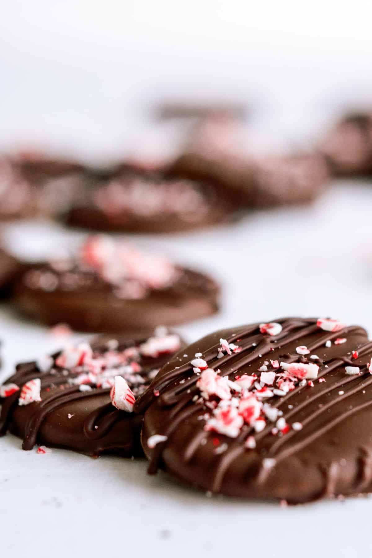 Close up of two No Bake Thin Mint Ritz Cracker Cookies stacked