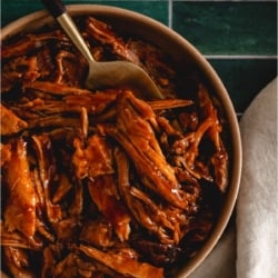 Top view of Slow Cooker Smoky BBQ Pulled Pork in a bowl.