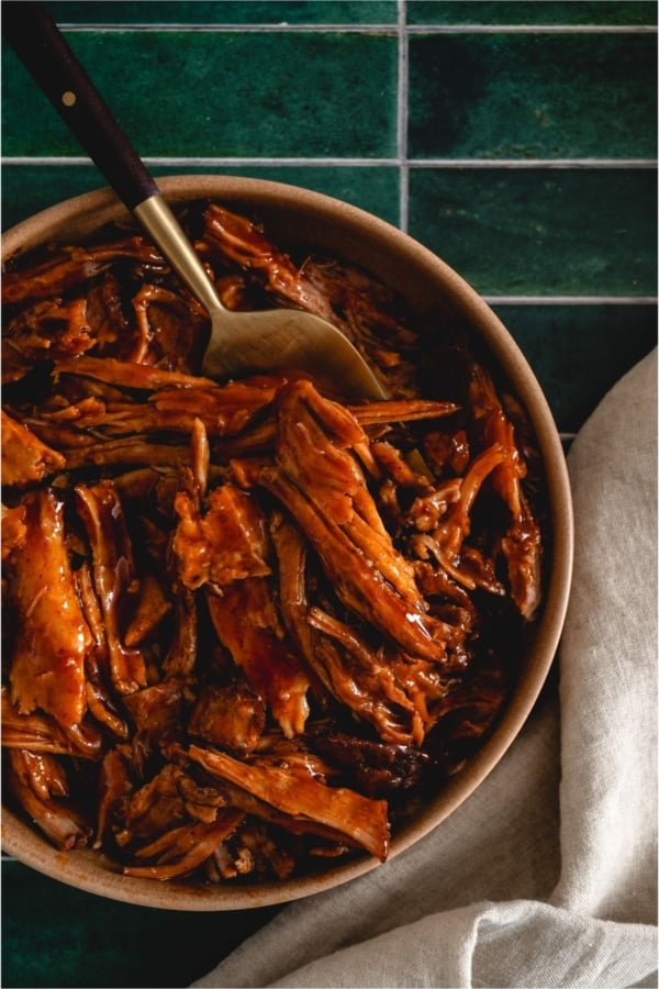 Top view of Slow Cooker Smoky BBQ Pulled Pork in a bowl.