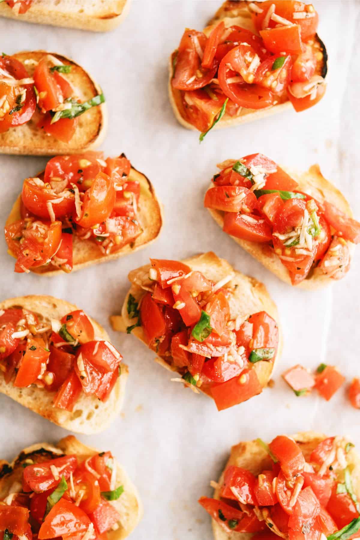 A pan full of Fresh Classic Bruschetta on sliced bread