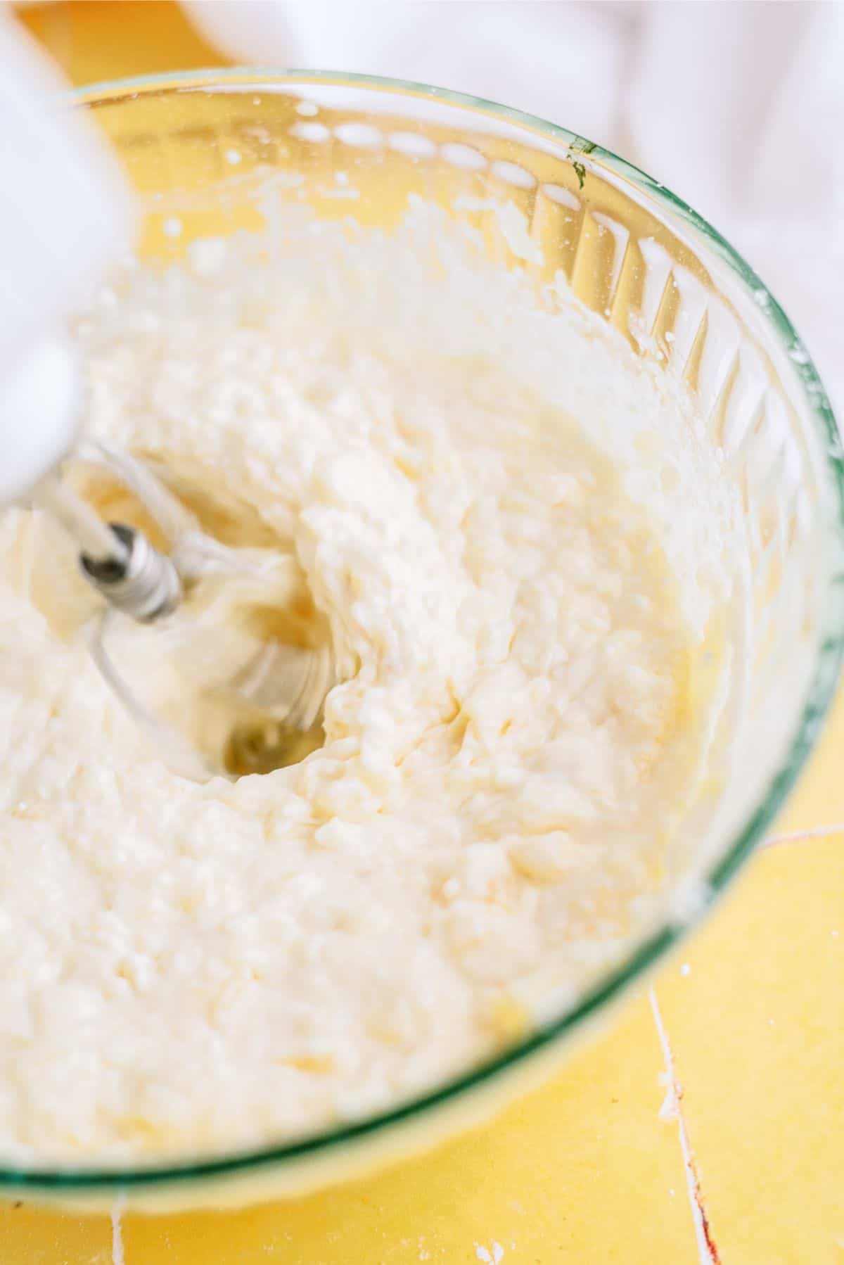 Mixing ingredients for cream cheese mixture in a mixing bowl