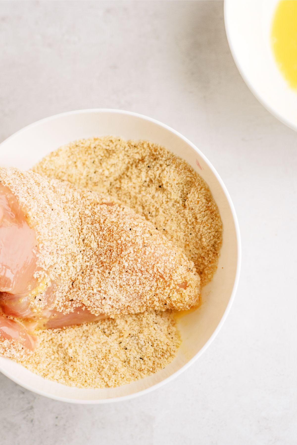 Chicken breast dredged in bread crumbs