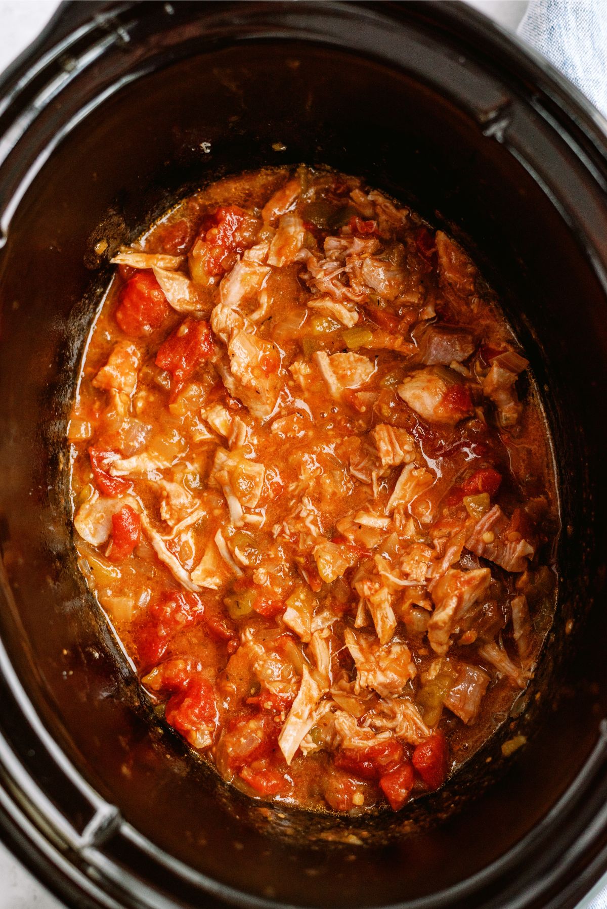 Cooked and shredded pork in the slow cooker