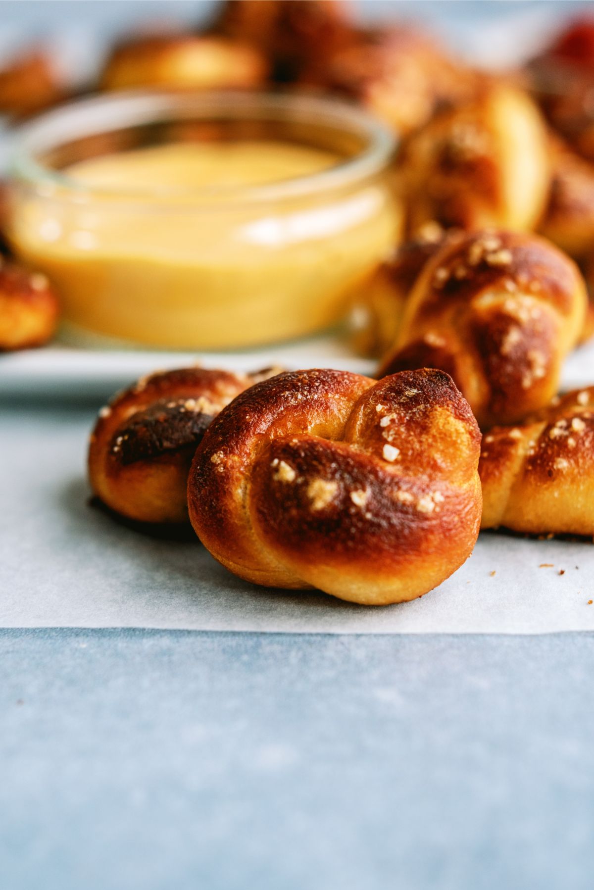 Twisted Soft Pretzel Bites with a side of queso
