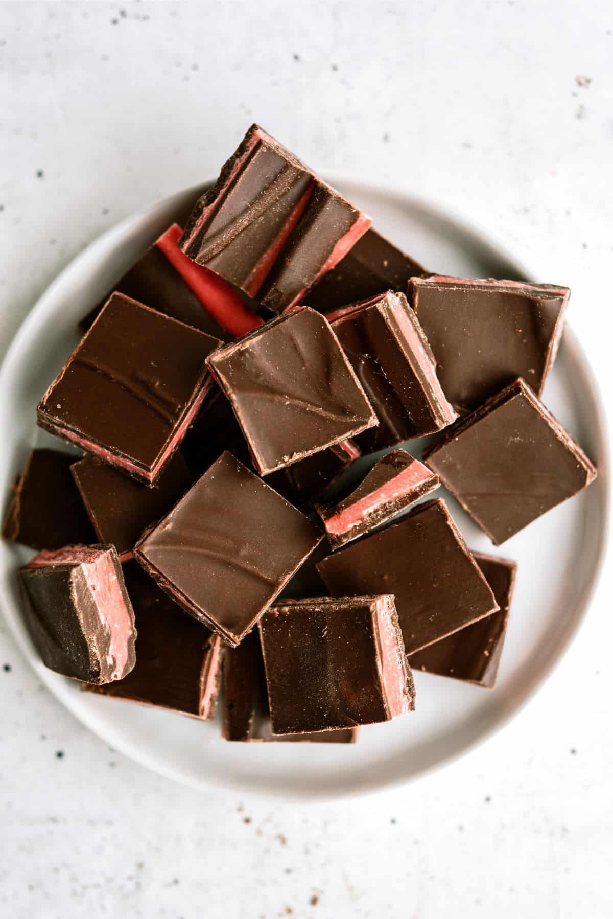 Top view of Valentine's Thin Mints cut into squares on a serving plate.