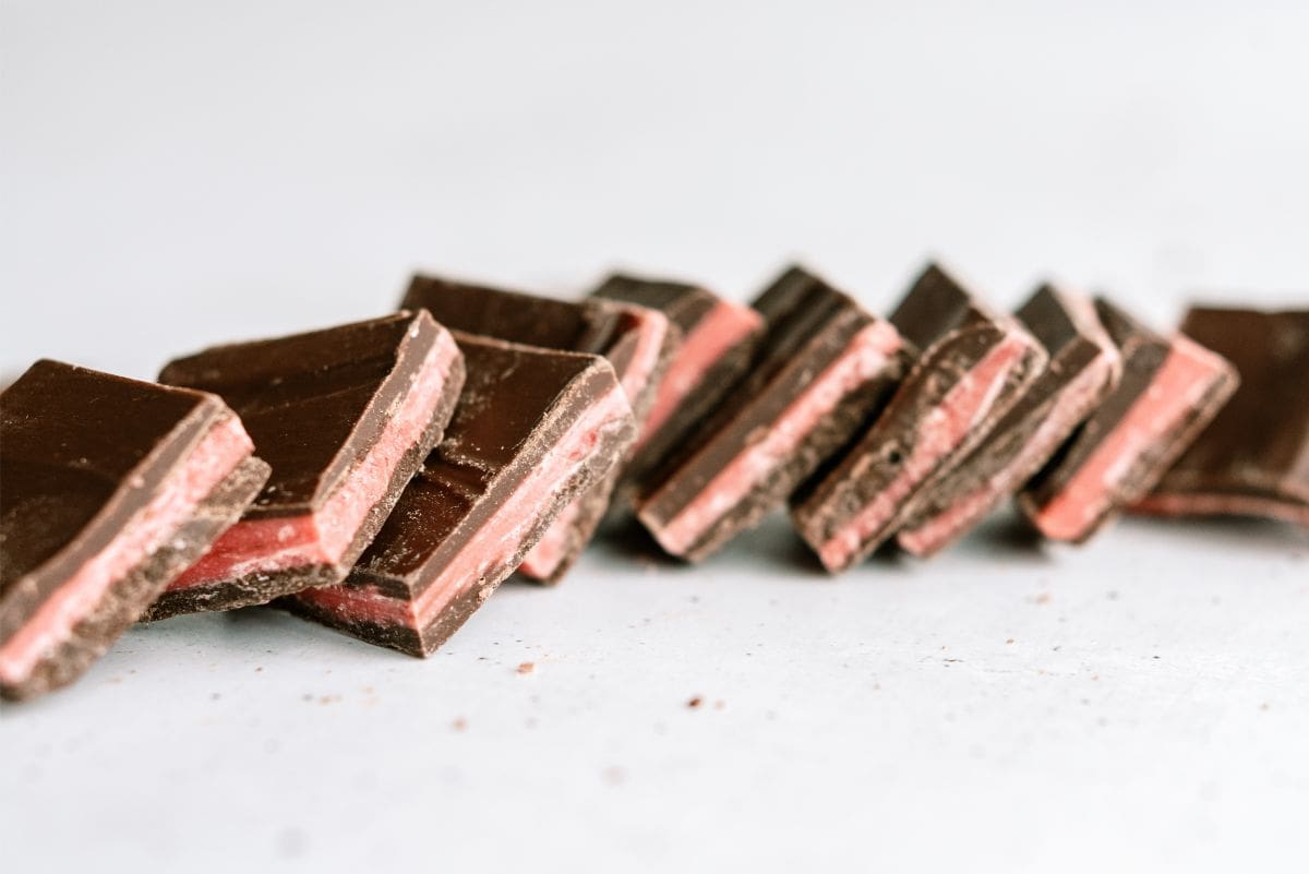 Valentine's Thin Mints cut into squares lined up leaning on each other.