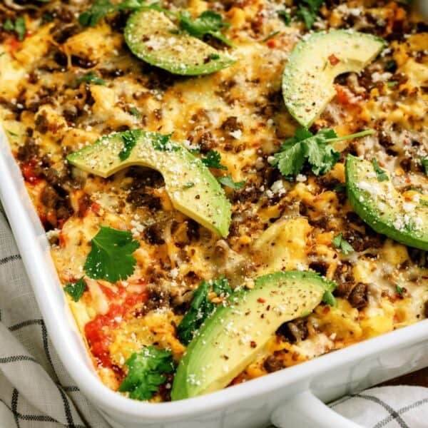 breakfast burrito casserole with avocado, cheese, and egg
