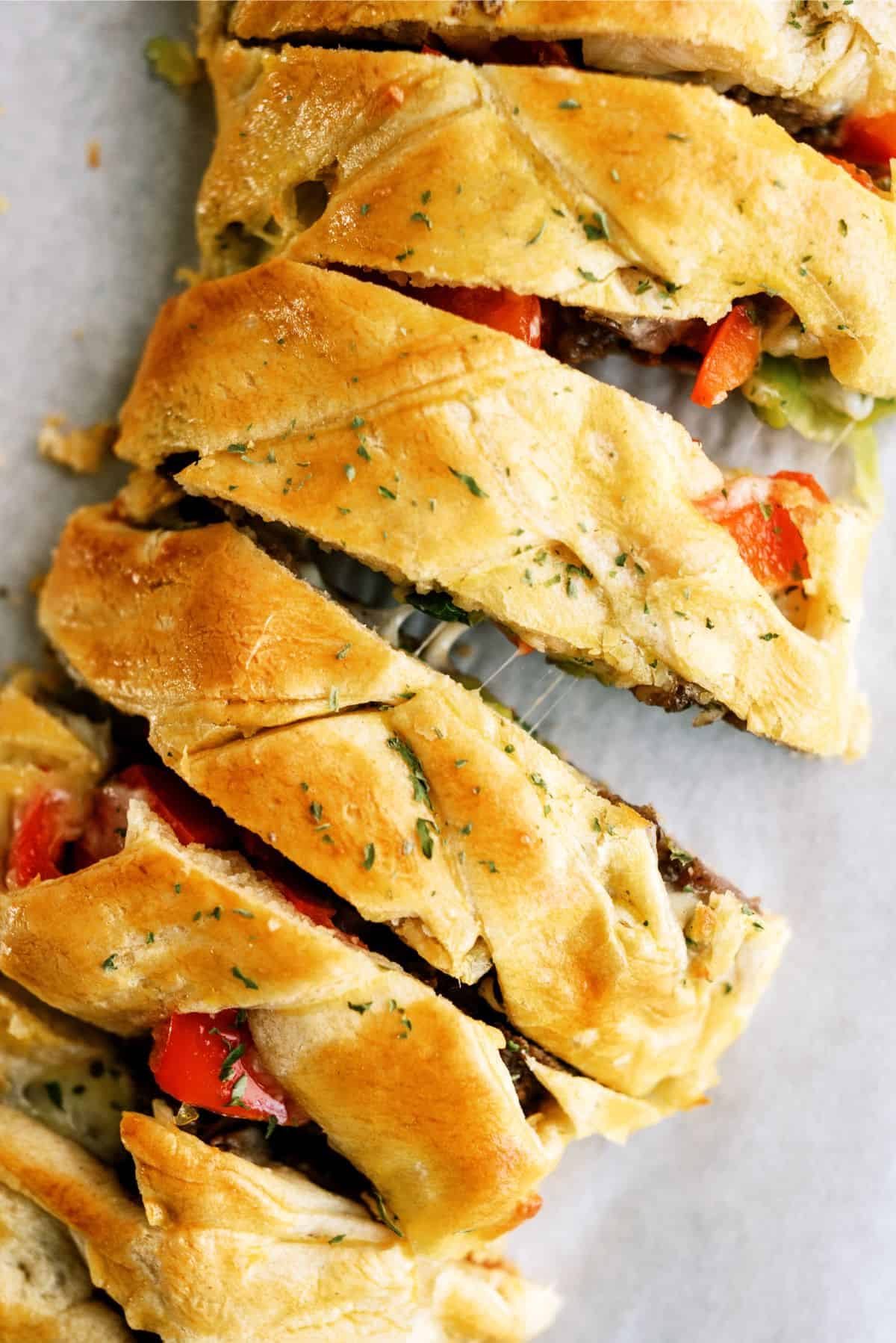 Top view of Cheesesteak Crescent Braid sliced