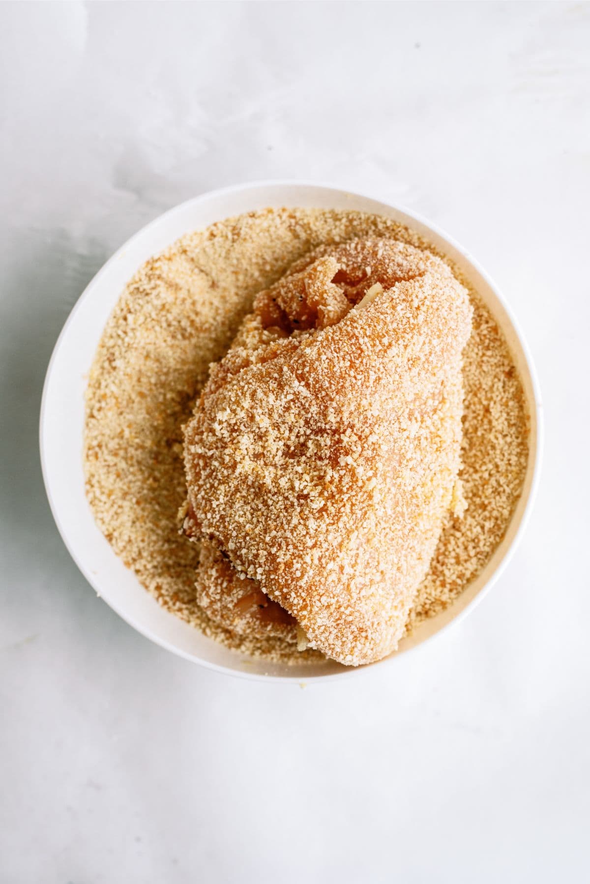 Rolled up chicken breast dipped in bread crumbs