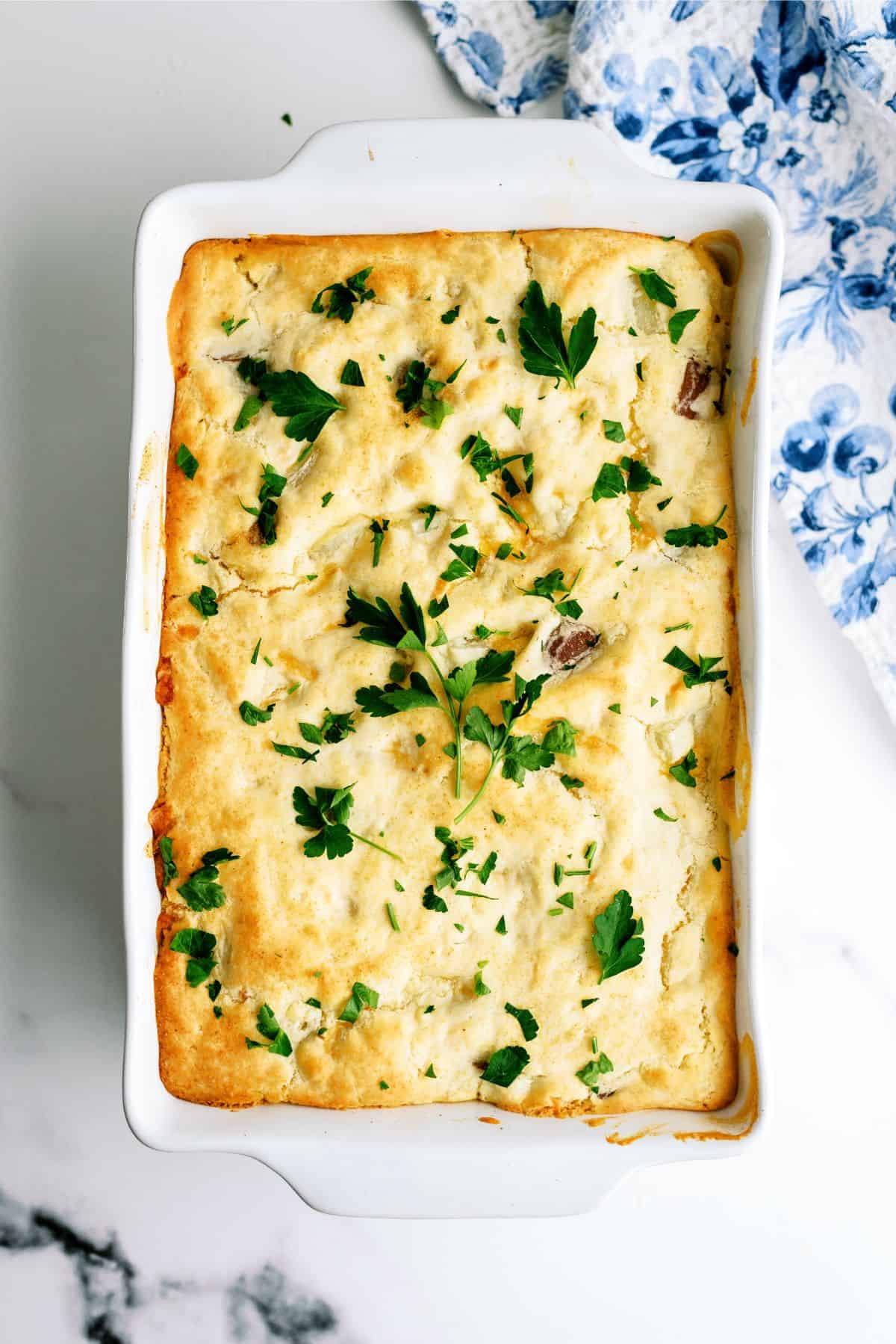 Cheesy Chicken Pot Pie baked in casserole dish