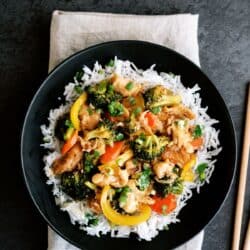 instant pot chicken and veggie stir fry on a plate with rice