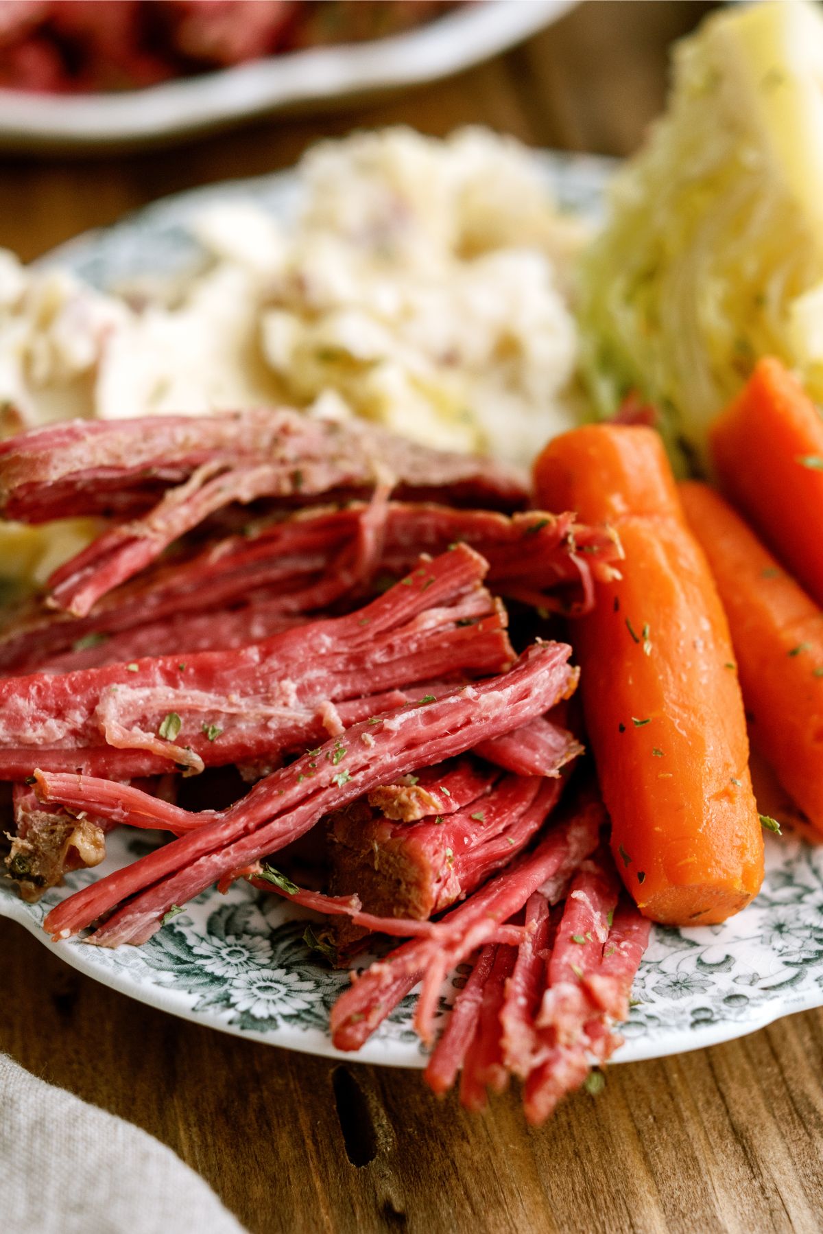 Close up of Instant Pot Corned Beef and Cabbage served on a plate