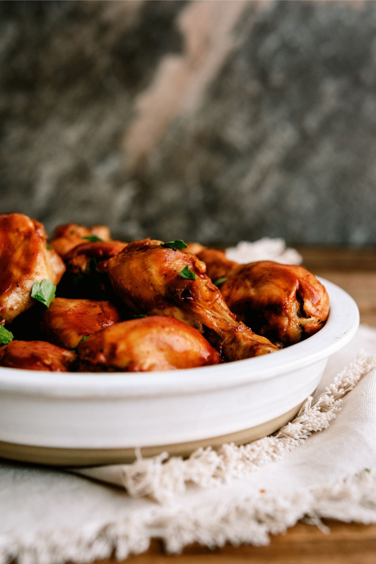 A bowl of Slow Cooker BBQ Chicken Drumsticks