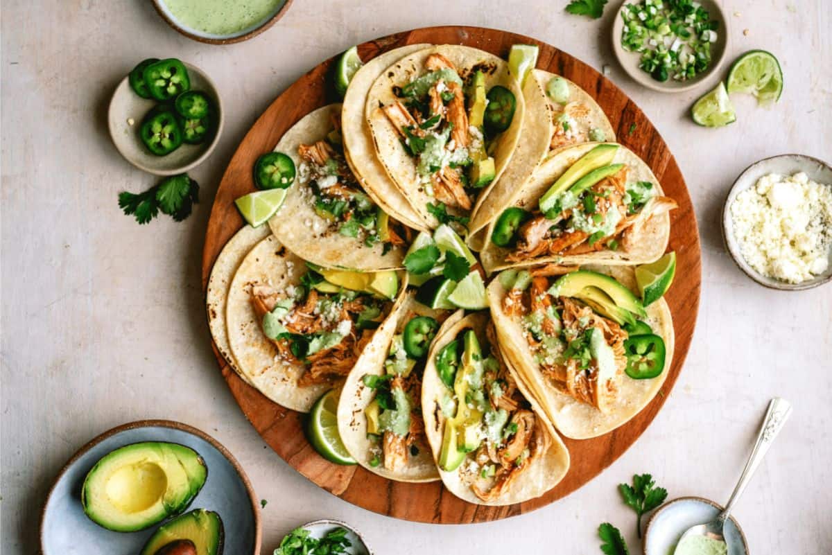 Top view of a platter of Slow Cooker Chicken Tinga Tacos