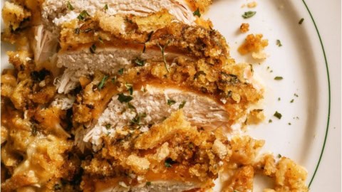 Slow Cooker Swiss Chicken sliced on a plate.