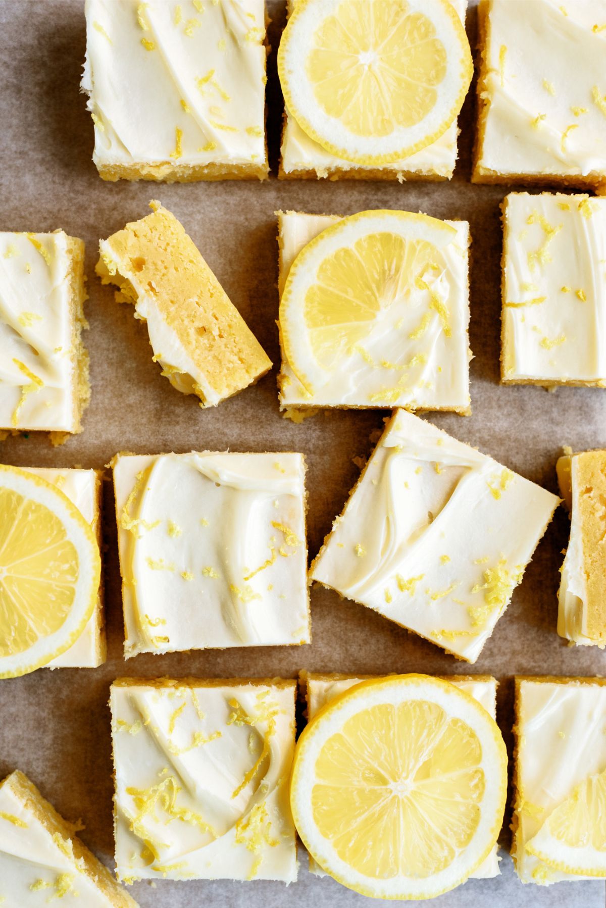 Lemon Brownies with Lemon Frosting cut into squares.