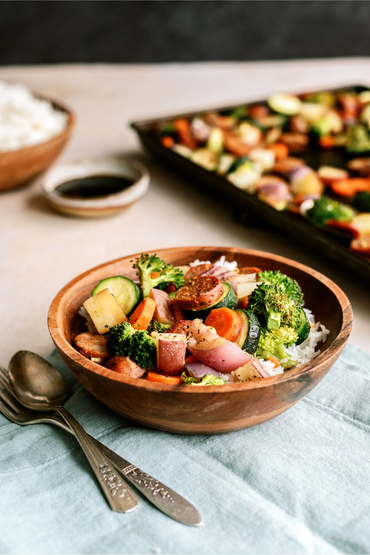 One Pan Garlic Sausage and Vegetables with one serving in a bowl