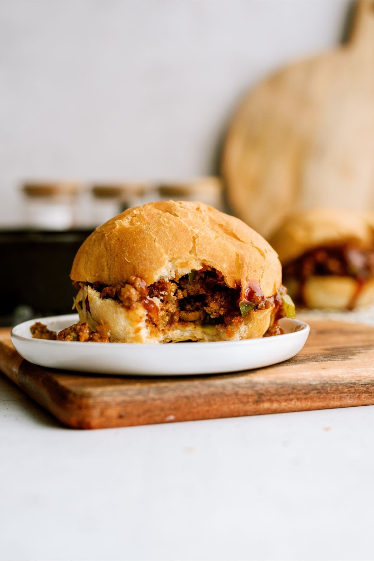 BBQ Sloppy Joes sandwich with a bite taken out of it
