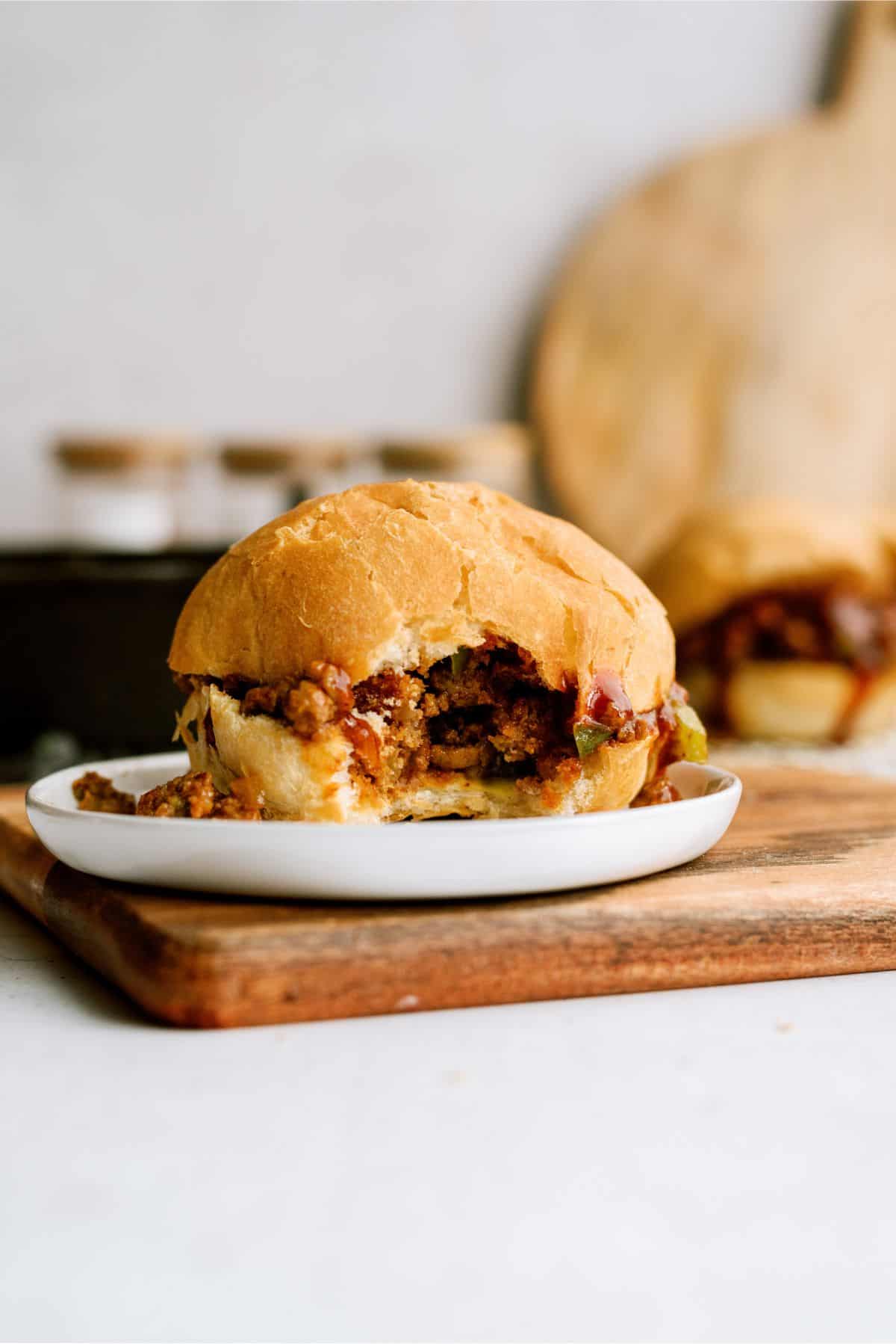 BBQ Sloppy Joes sandwich with a bite taken out of it