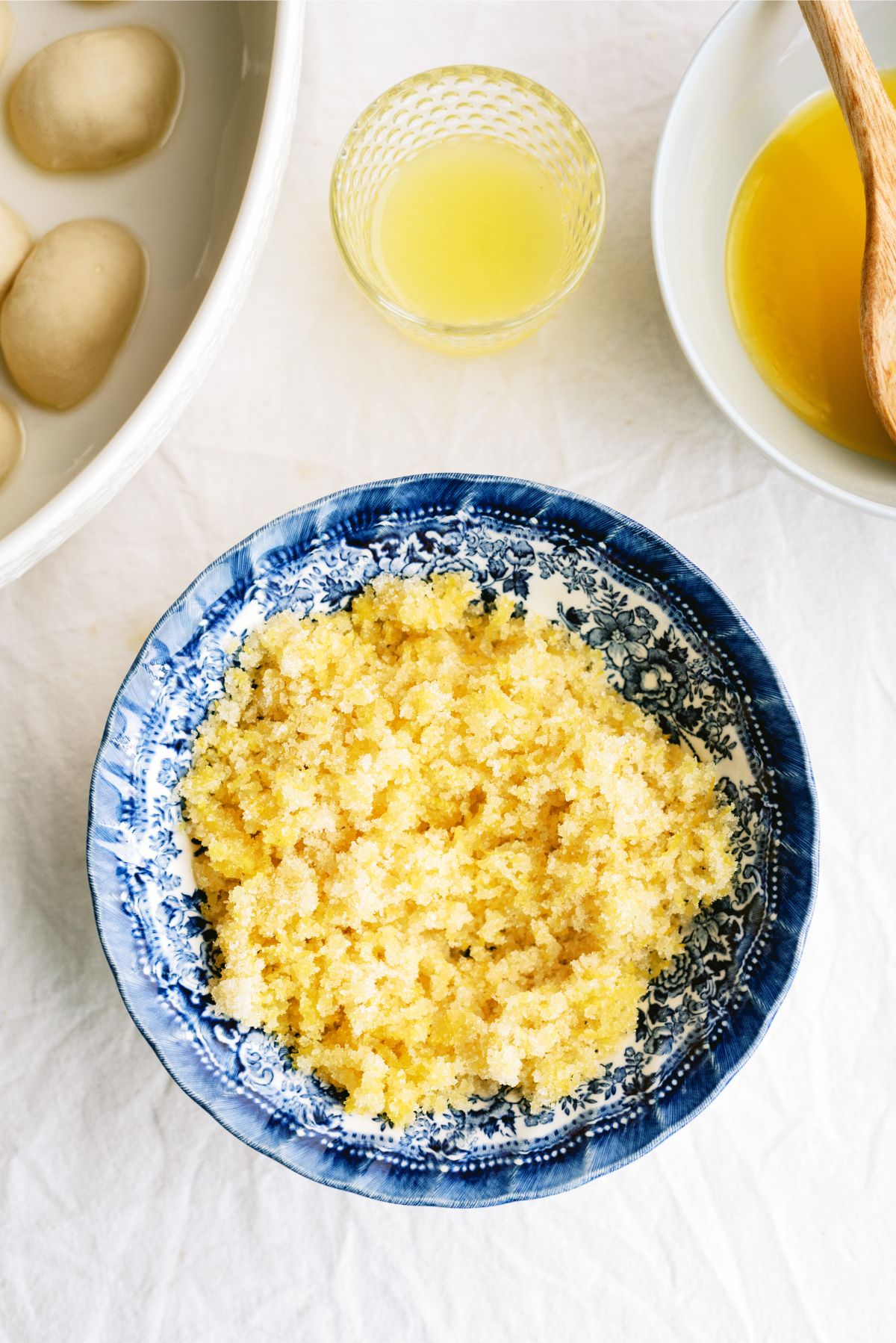 Lemon zest with sugar in a small mixing bowl