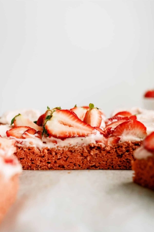 Side view of Frosted Strawberry Sheet Cake showing the cake layer.